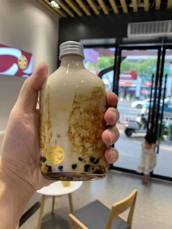 奶茶店是加盟好。还是自己开好?